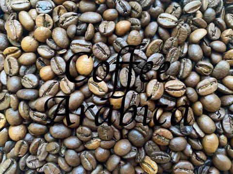 Coffee beans close-up in the background Stock Photos
