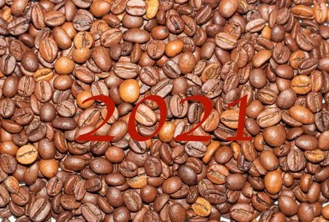 Coffee beans close-up in the background Stock Photos