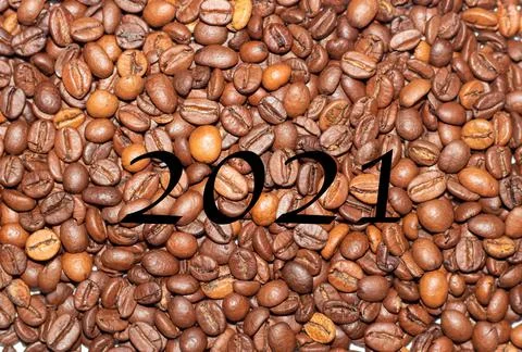 Coffee beans close-up in the background Stock Photos