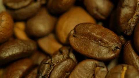 Coffee beans Close-up macro shot are roasted pan camera comes from coffee beans Stock Footage 107736686