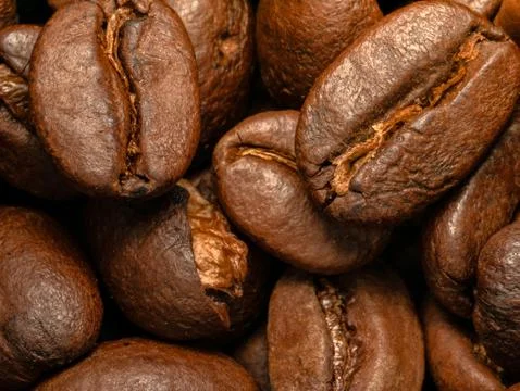 Coffee beans Close-up macro shot are roasted. Stock Photos