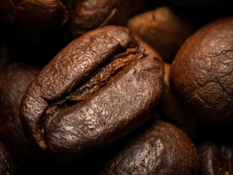 Coffee beans Close-up macro shot are roasted. Stock Photos