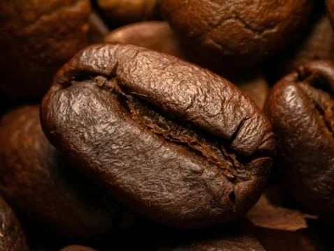 Coffee beans Close-up macro shot are roasted. Stock Photos