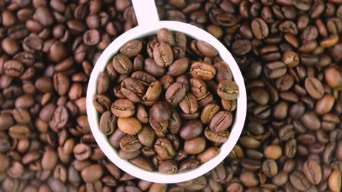 Coffee beans close-up on the table. selective focus. Stock Footage 147971219
