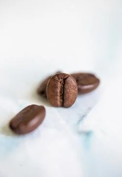 Coffee beans close up on textured background Stock Photos