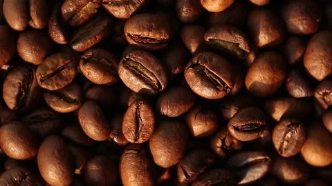 Coffee beans close-up top view circular rotation. Stock Footage 143522382