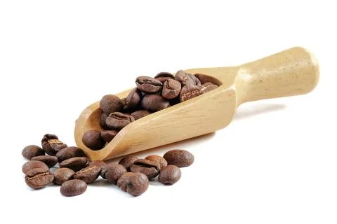 Coffee beans close up on white background. Stock Photos