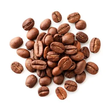 Coffee beans close-up on a white. Isolated, top view. Stock Photos