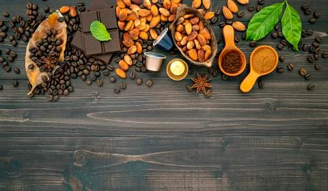 Coffee beans , cocoa beans ,coffee capsule ,dark chocolate bar and coffee pow Stock Photos