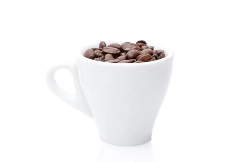 Coffee beans in coffee cup Stock Photos