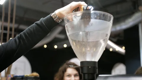  coffee beans on coffee grinding machine 動画素材 103542406