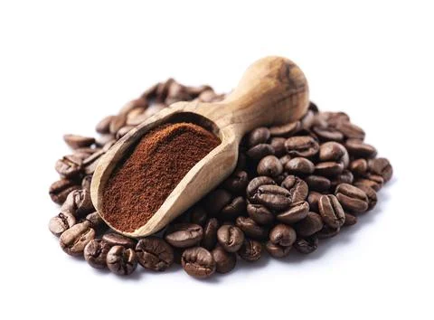 Coffee beans with coffee ground Stock Photos