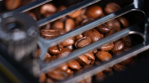 Coffee beans in a coffee machine. Stock Footage 238700262