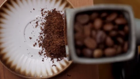 Coffee beans in the coffee mill Stock Footage 128949360