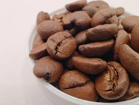 Coffee beans in a container large Foto stock