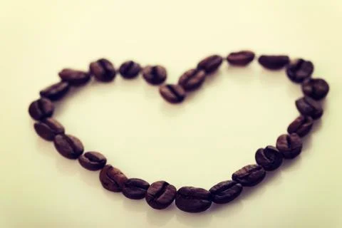 Coffee beans conventionalized to heart Stock Photos