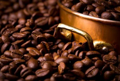 Coffee beans with copper pot, full frame Stock Photos