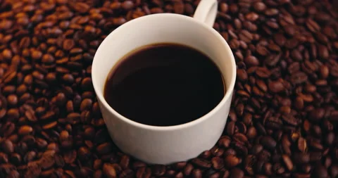 Coffee beans, cup and above for supply chain, hospitality industry and Stock Footage 326006118