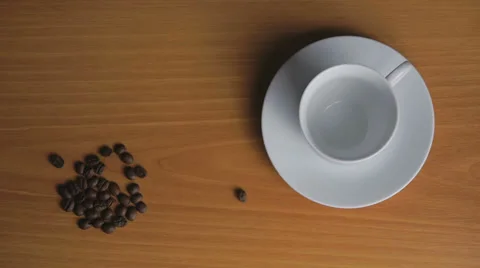 Coffee beans in a cup and crawl welded Stock Footage 35531599