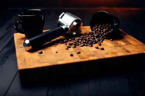 Coffee beans cup and portafilter aromatic coffee Stock Photos