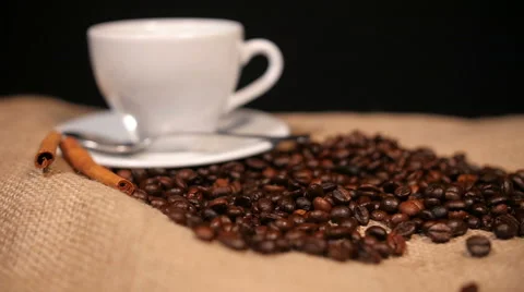 Coffee Beans, Cup, Cinnamon and Croissant on Bagging Video stock 59902308