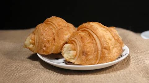 Coffee Beans, Cup, Cinnamon and Croissant on Bagging Video stock 59902587