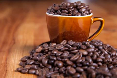 Coffee beans in the cup, close up Stock Photos