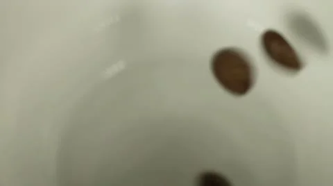 Coffee beans in a cup Stock Footage 12167234
