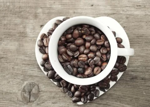 Coffee beans in a cup Foto stock