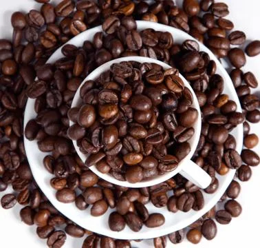 Coffee beans in a cup Stockfoto's