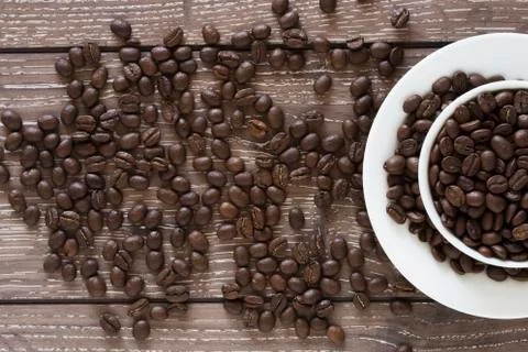 Coffee beans in a cup Stock Photos