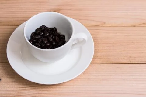 Coffee beans in the cup Stock Photos