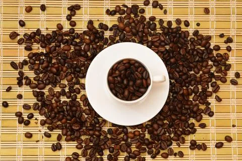 Coffee beans in a cup Stock Photos
