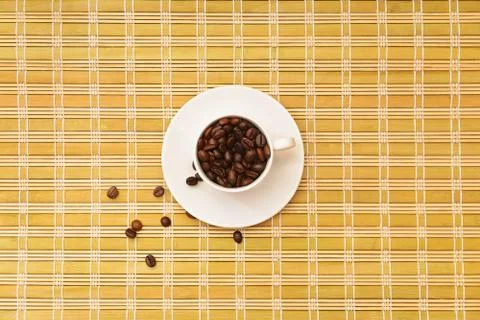 Coffee beans in a cup Stock Photos