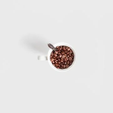 Coffee beans in a cup Stock Photos
