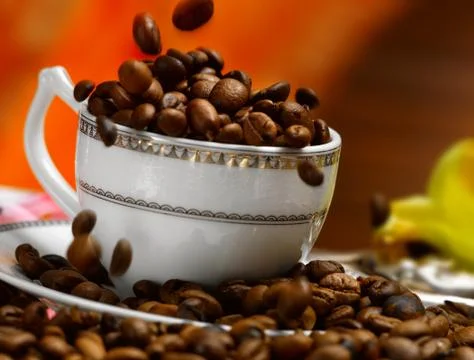 Coffee beans in a cup Stock Photos