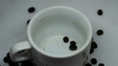 Coffee beans in the cup2 Stock Footage 104095914