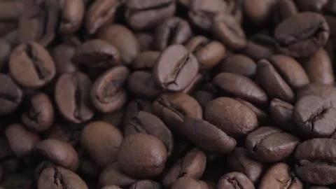 Coffee beans. Dark roast coffee beans top view, rotate. Close up Stock Footage 303016946