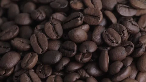 Coffee beans. Dark roast coffee beans top view, rotate. Close up Stock Footage 303017477