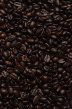 Coffee beans dark roasted background texture material Stock Photos