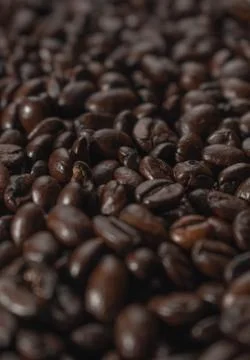 Coffee beans dark roasted background texture material Stock Photos
