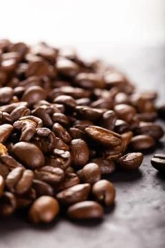 Coffee beans on dark stone table. Stock-Fotos