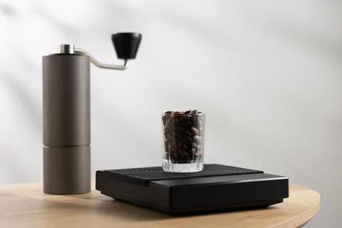 Coffee beans on a digital scale Stock Photos