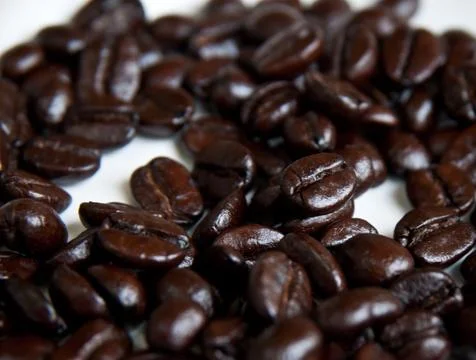 Coffee beans on a disk . Foto stock