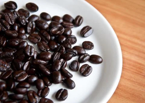 Coffee beans on a disk . Foto stock