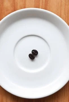 Coffee beans on a disk . Foto stock