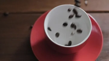 Coffee beans dropping into cup 1 動画素材 85806206