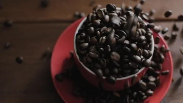Coffee beans dropping into cup 2 Stock Footage 85806223