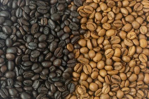 Coffee beans dry process and dark close up image. Stock Photos