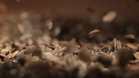 Coffee beans exploding in slow motion 4K Stock Footage 164089645